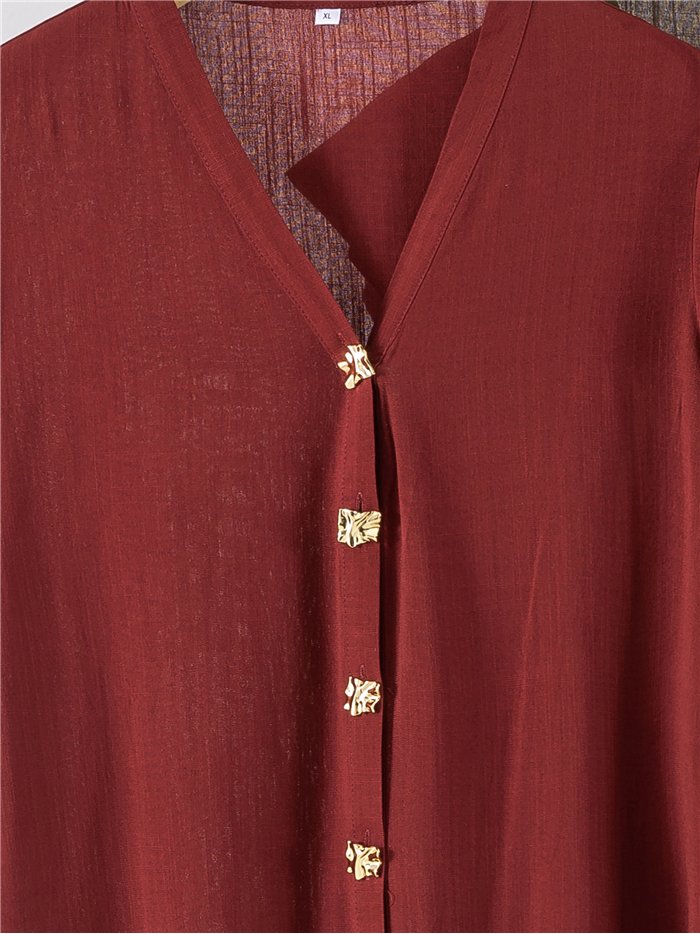 Blusa de lino talla grande con botones joya