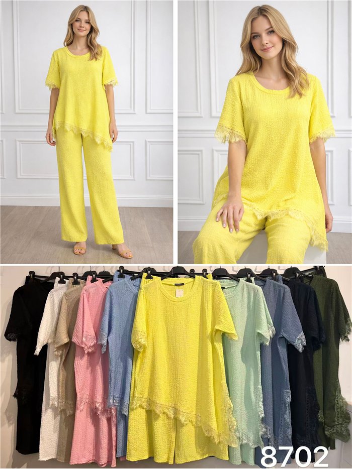 Conjunto texturizado: blusa e calça assimétricas de renda