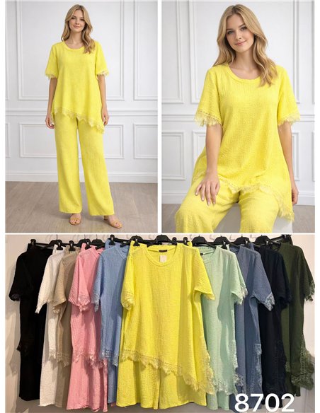 Conjunto texturizado: blusa e calça assimétricas de renda