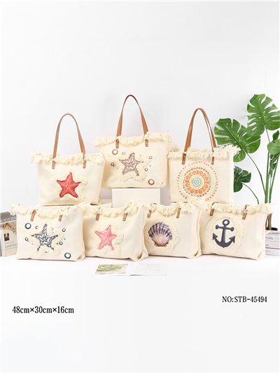 Bolso tote marino con flecos 2