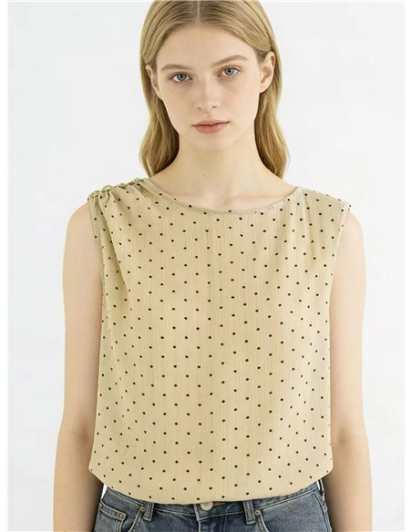 Blusa lunares sin manga detalle metálico en hombro