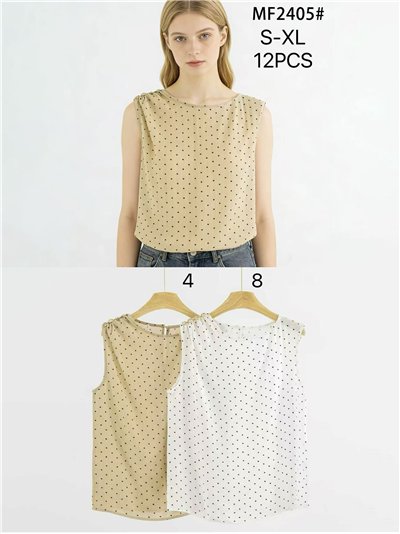 Blusa sem mangas com estampa de bolinhas e detalhe metálico no ombro. 2