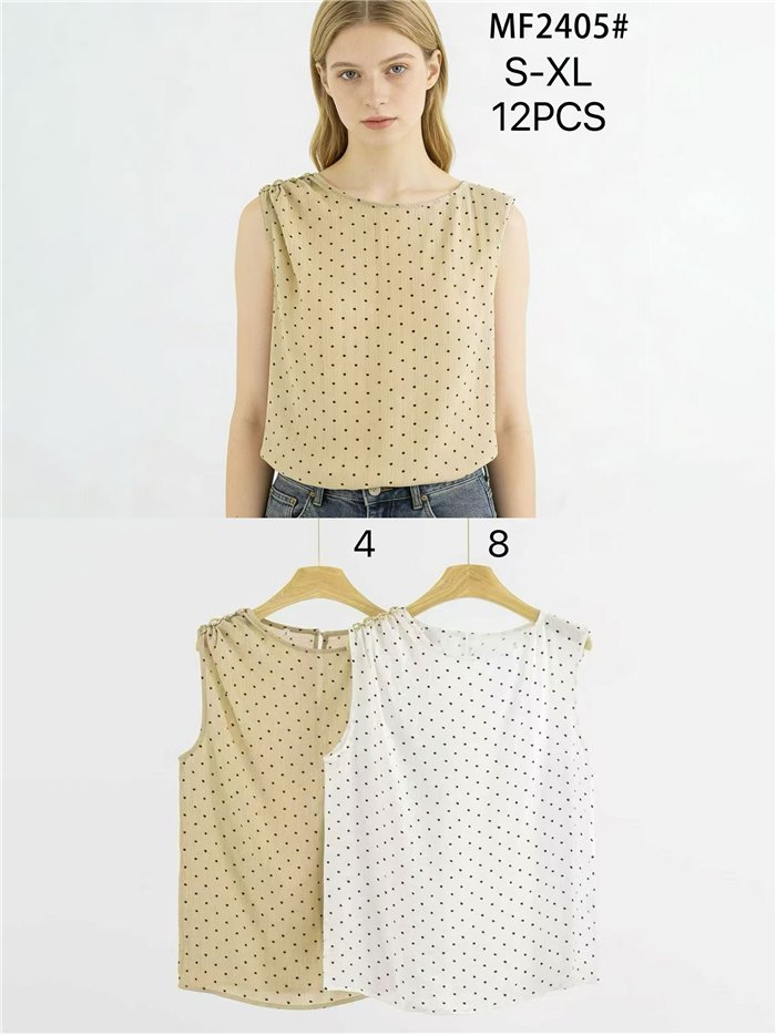 Blusa lunares sin manga detalle metálico en hombro