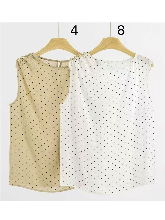 Blusa lunares sin manga detalle metálico en hombro