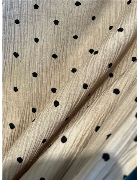 Blusa lunares sin manga detalle metálico en hombro