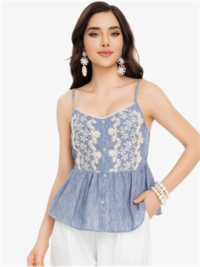 Top peplo in denim con ricami floreali