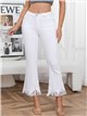 White flare jeans with frayed hem