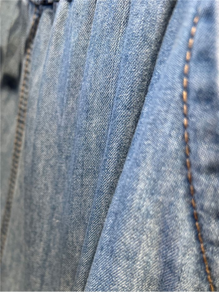 Pantalón denim ancho con cordón