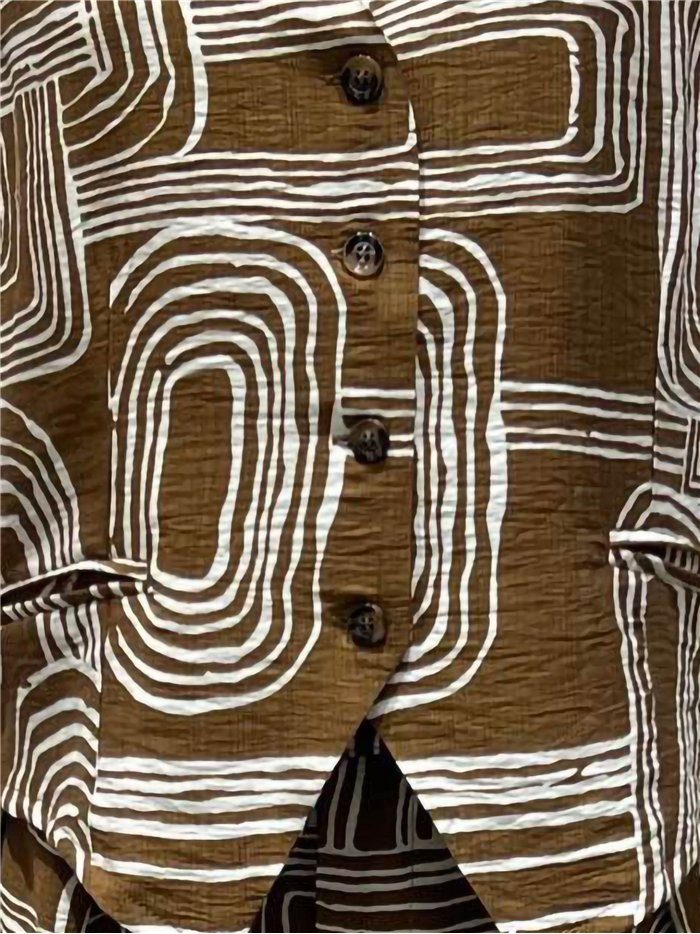 Conjunto geométrico de chaleco y pantalón palazzo