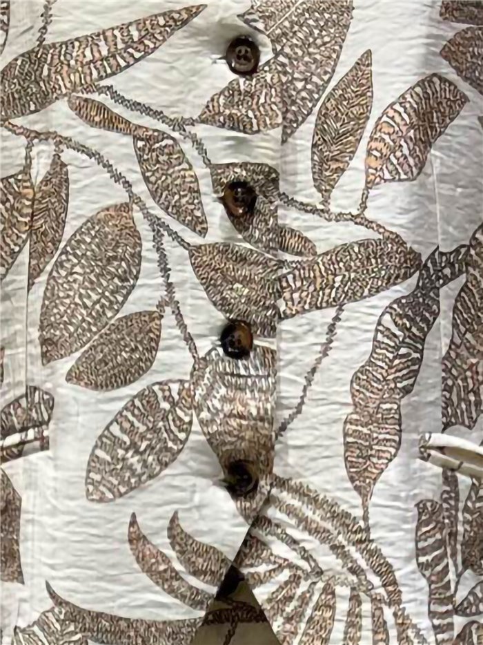 Conjunto hojas tropicales de chaleco y pantalón palazzo