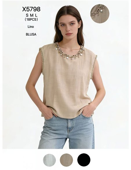 Blusa de lino con cuello conchas