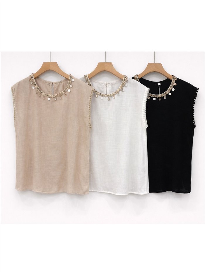 Blusa de lino con cuello conchas