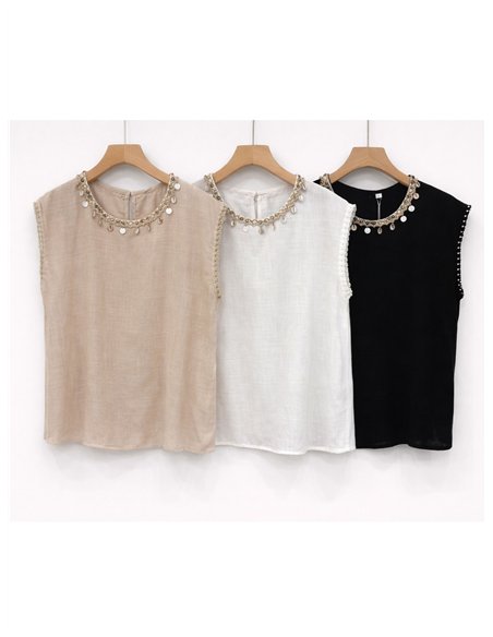 Blusa de lino con cuello conchas