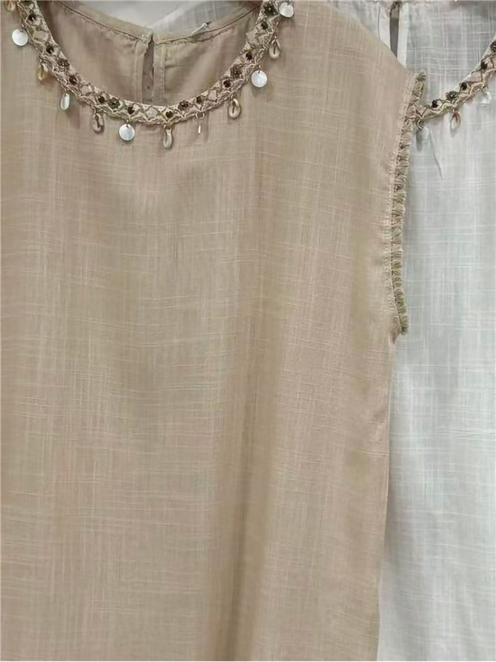 Blusa de lino con cuello conchas