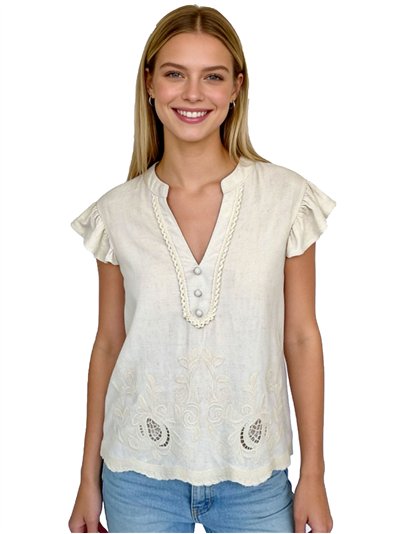 Blusa de linho com babados e bordado vazado.