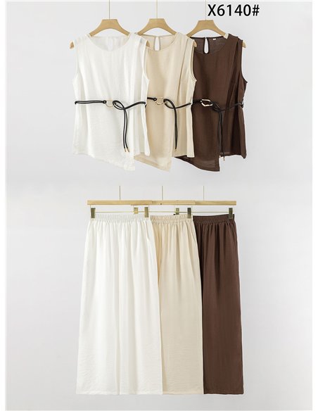 Conjunto top asimétrico con cinturón y pantalón ancho