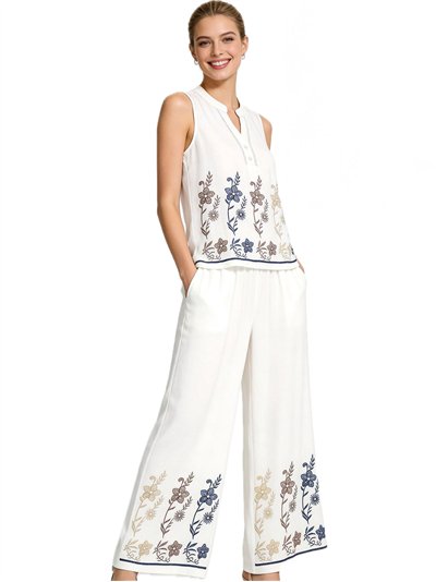 Conjunto blusa bordada floral y pantalón ancho