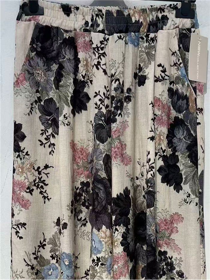 Romantici pantaloni a gamba larga con stampa floreale
