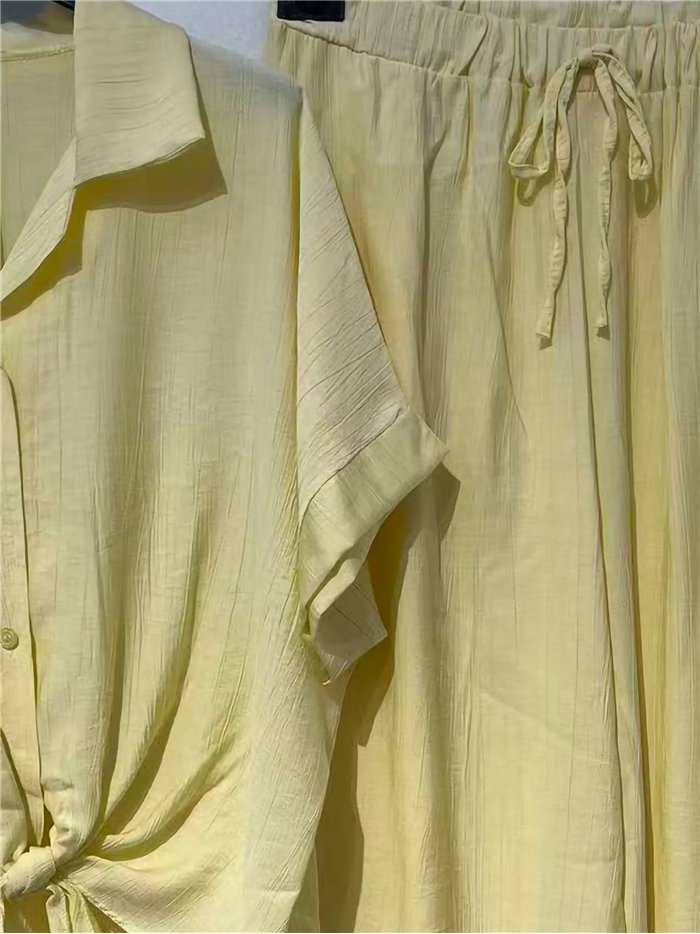 Conjunto de camisa fluida anudada y pantalón