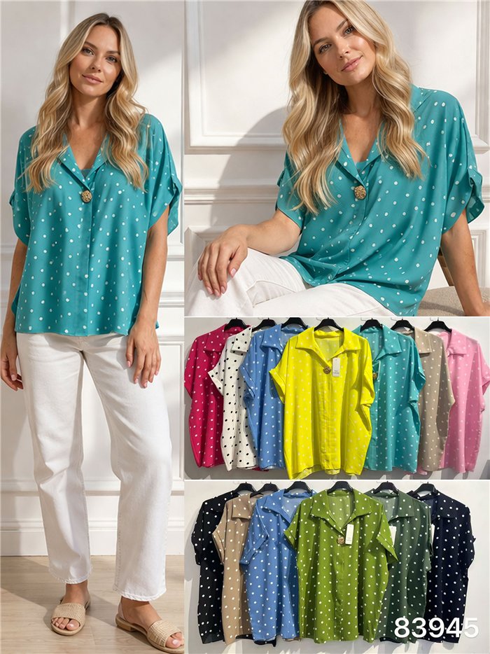 Blusa plus size de bolinhas com detalhe de broche