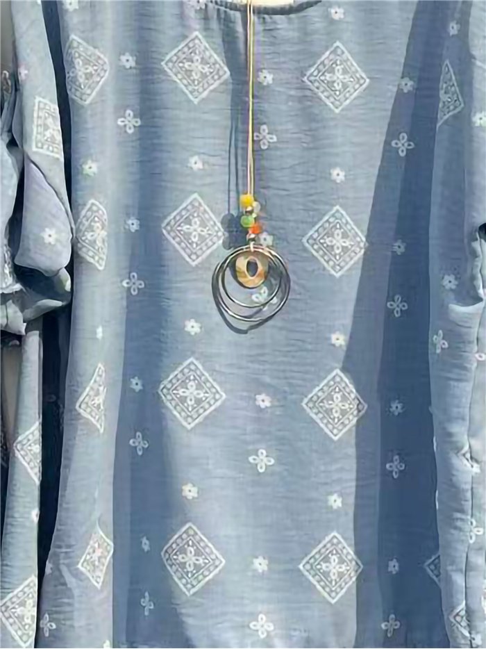 Conjunto blusa amplia rombos y pantalón