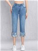 Jeans capri con vuelta bordada