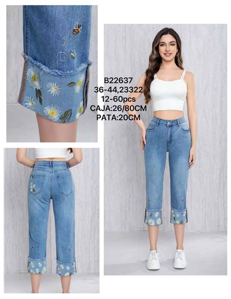 Jeans capri con vuelta bordada