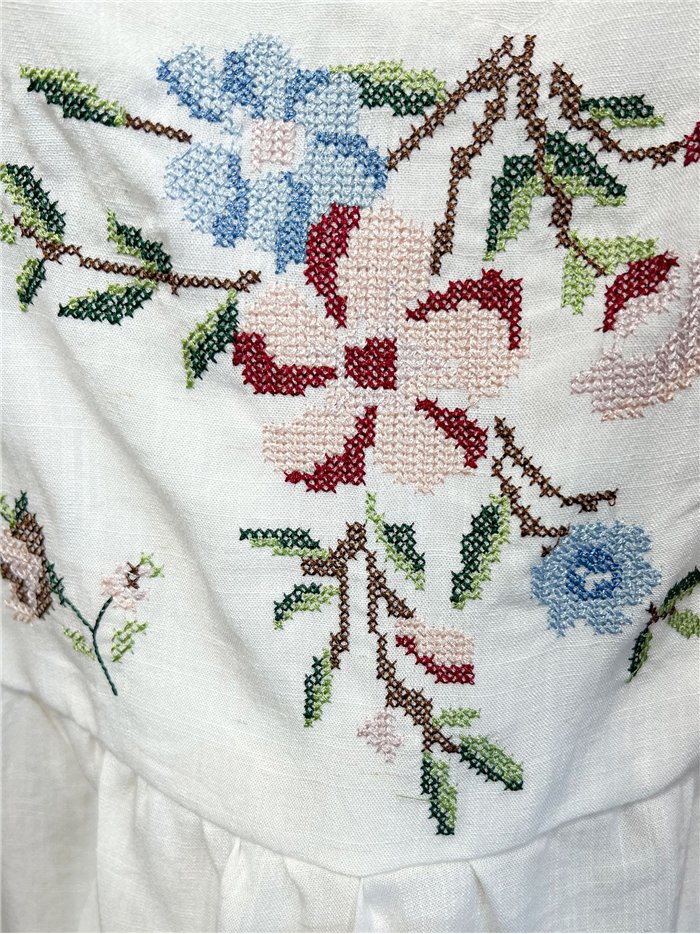 Floral embroidered peplum top