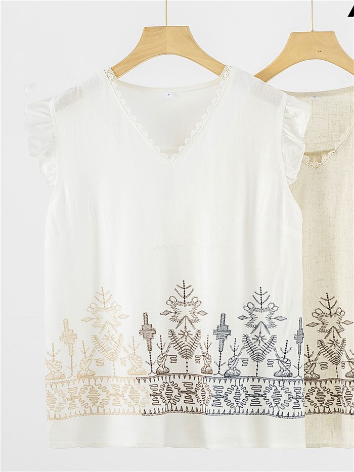 Blusa volante con bordado geométrico multicolor y puntillas