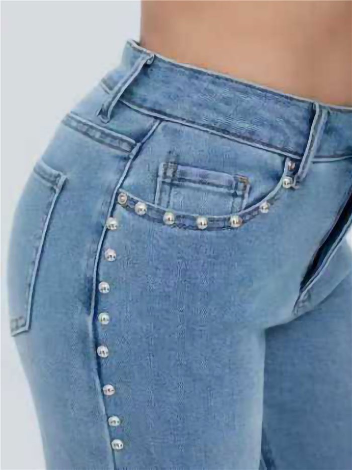 Jeans wide leg con tachas