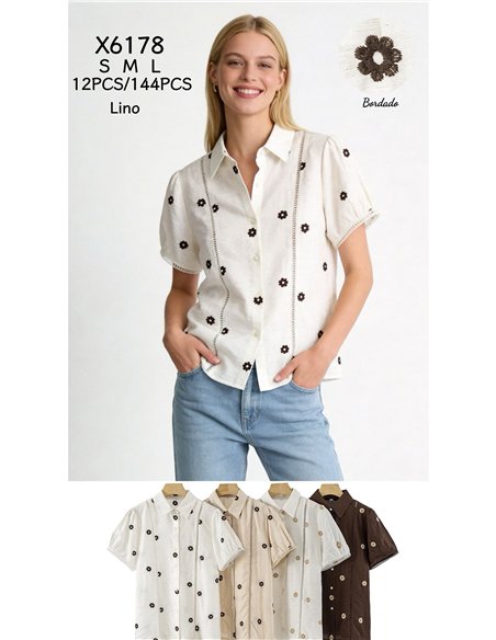 Camicia di lino ricamata con margherite