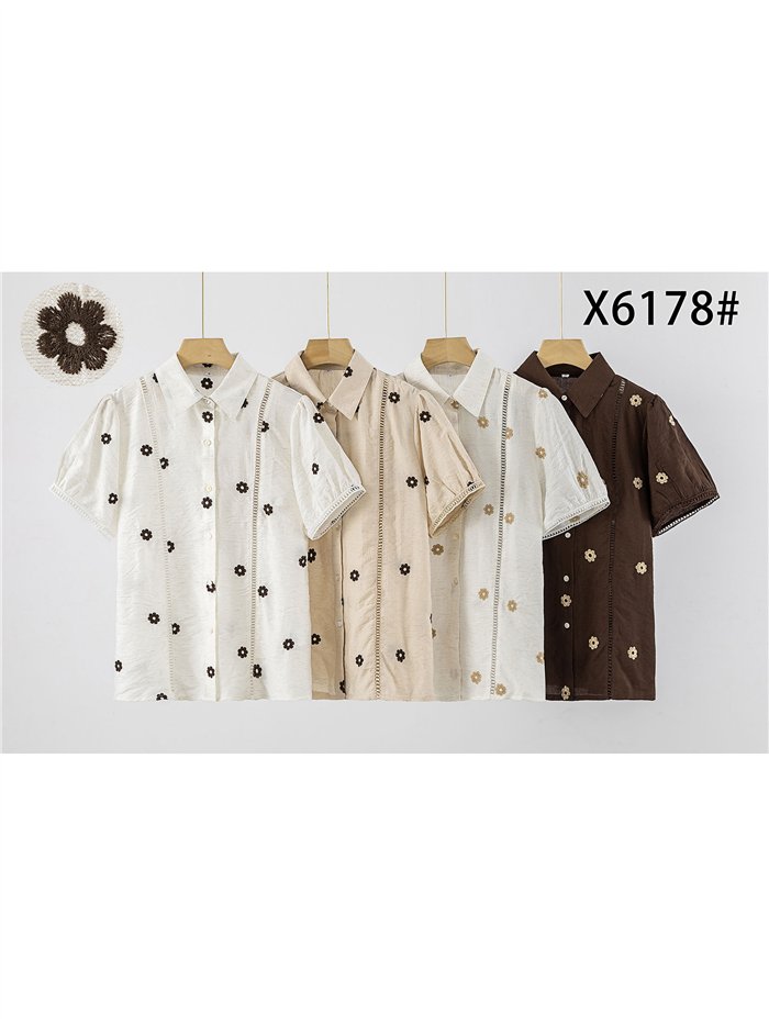 Camicia di lino ricamata con margherite