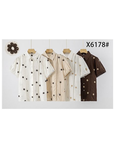 Camicia di lino ricamata con margherite