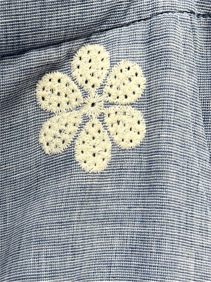 Daisy embroidered linen trousers