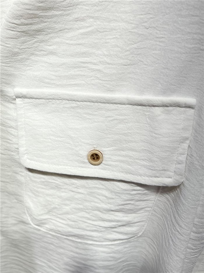 Conjunto blusa fluido con bolsillo y pantalón 