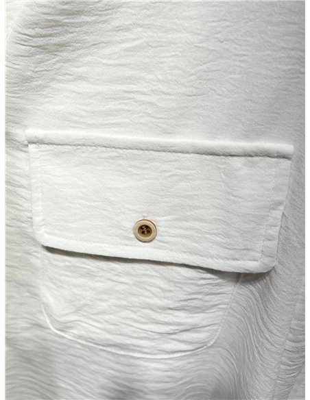 Conjunto blusa fluido con bolsillo y pantalón 