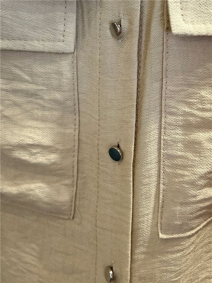 Blusa fluida con bolsillo