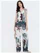 Completo composto da top tropicale e pantaloni palazzo