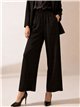 calças palazzo fluidas