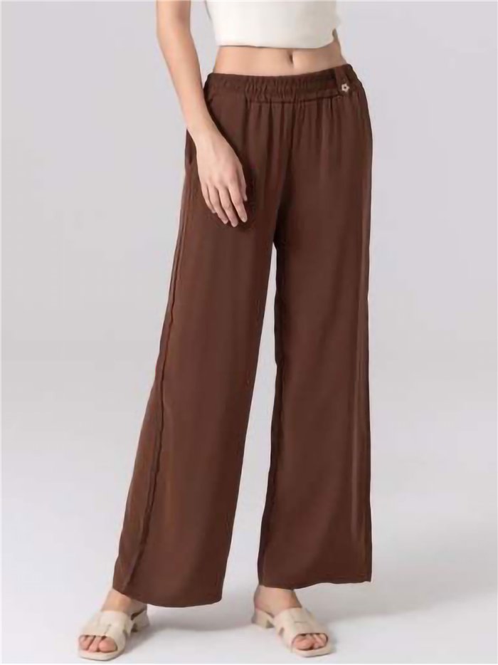 Calças fluidas com bolso