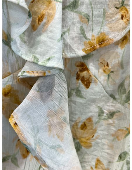 Top floral con volante