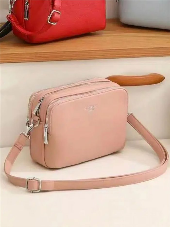 Bolso bandolera compacto doble cremallera