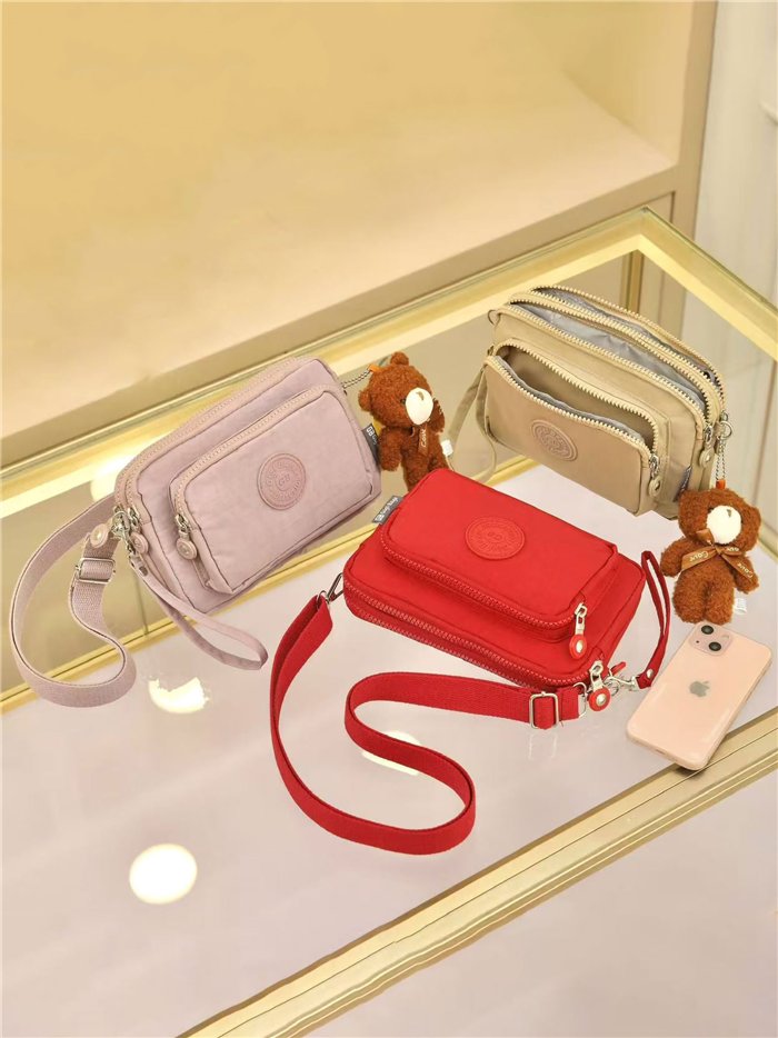 Bandolera nylon con charm de osito