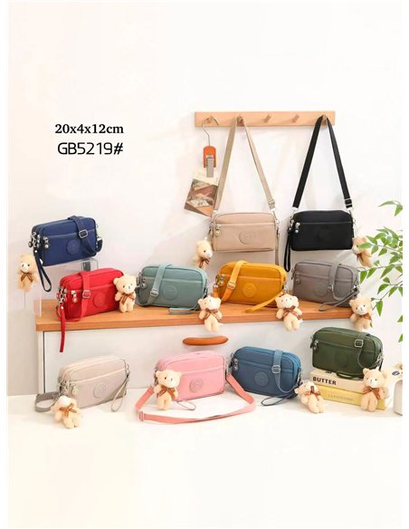 Bandolera multibolsillos con charm de osito