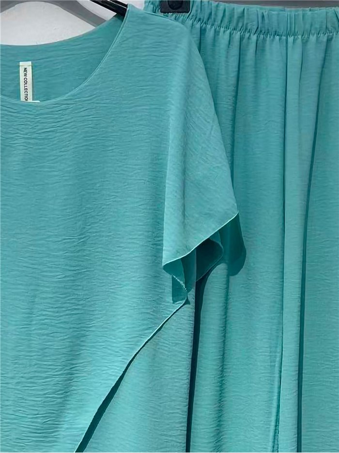 Conjunto blusa fluida asimétrica y pantalón