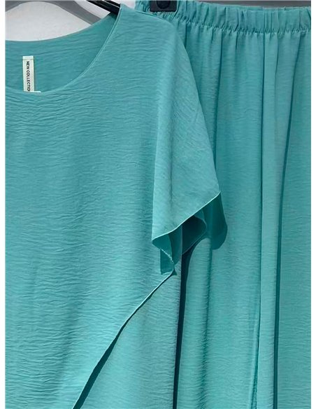 Conjunto blusa fluida asimétrica y pantalón
