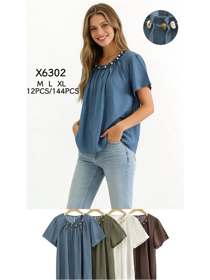 Blusa fluida con detalle abalorios