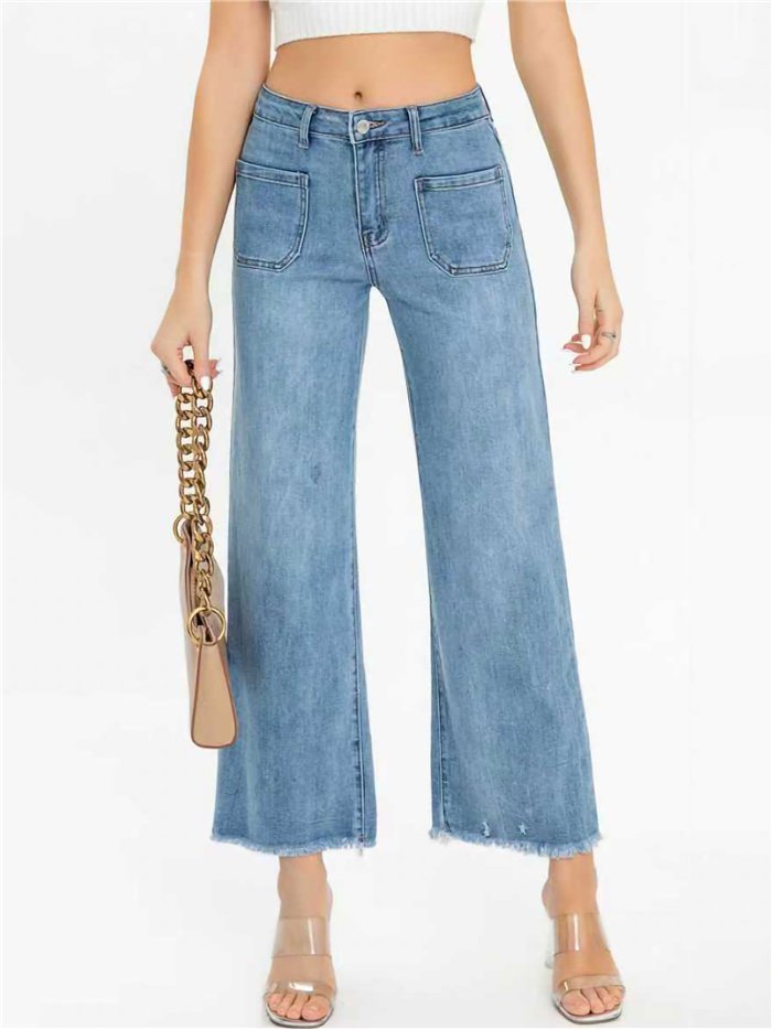 Jeans wide leg bolsillos parche