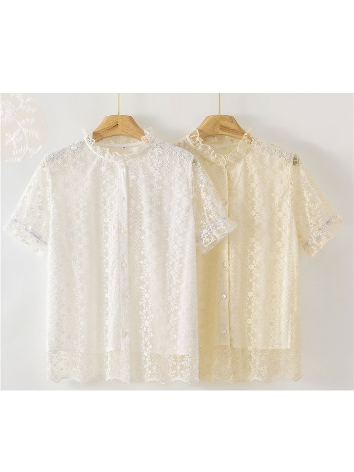 Camicetta in pizzo con scollo a balze