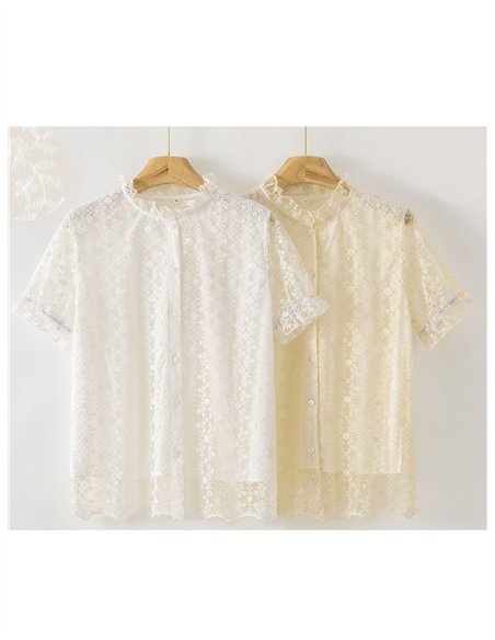 Camicetta in pizzo con scollo a balze